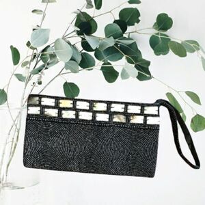 Black clutch with abalone shell and black beads